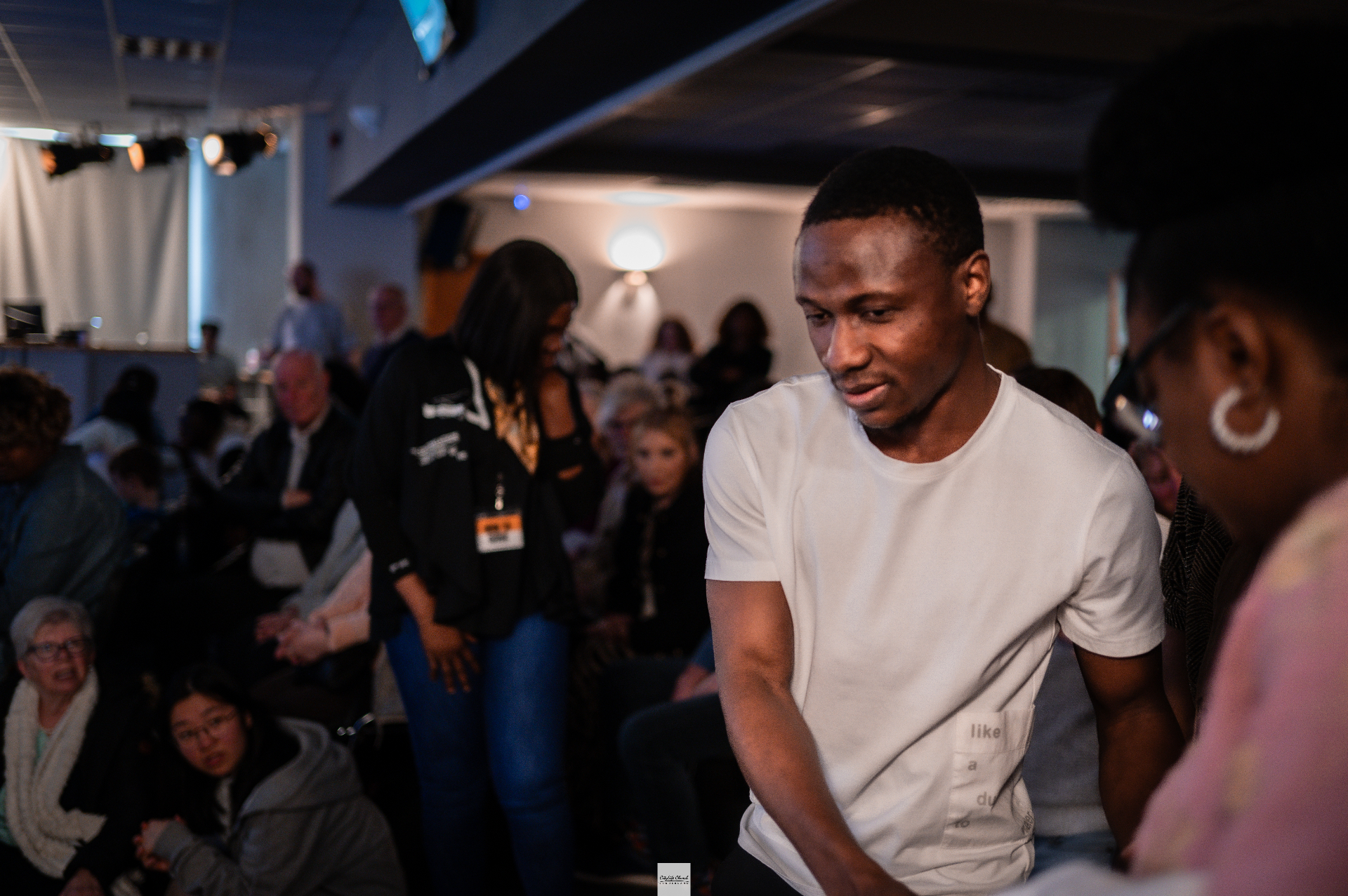 Joseph Ugwu engaging with an attendee at a Sunderland event