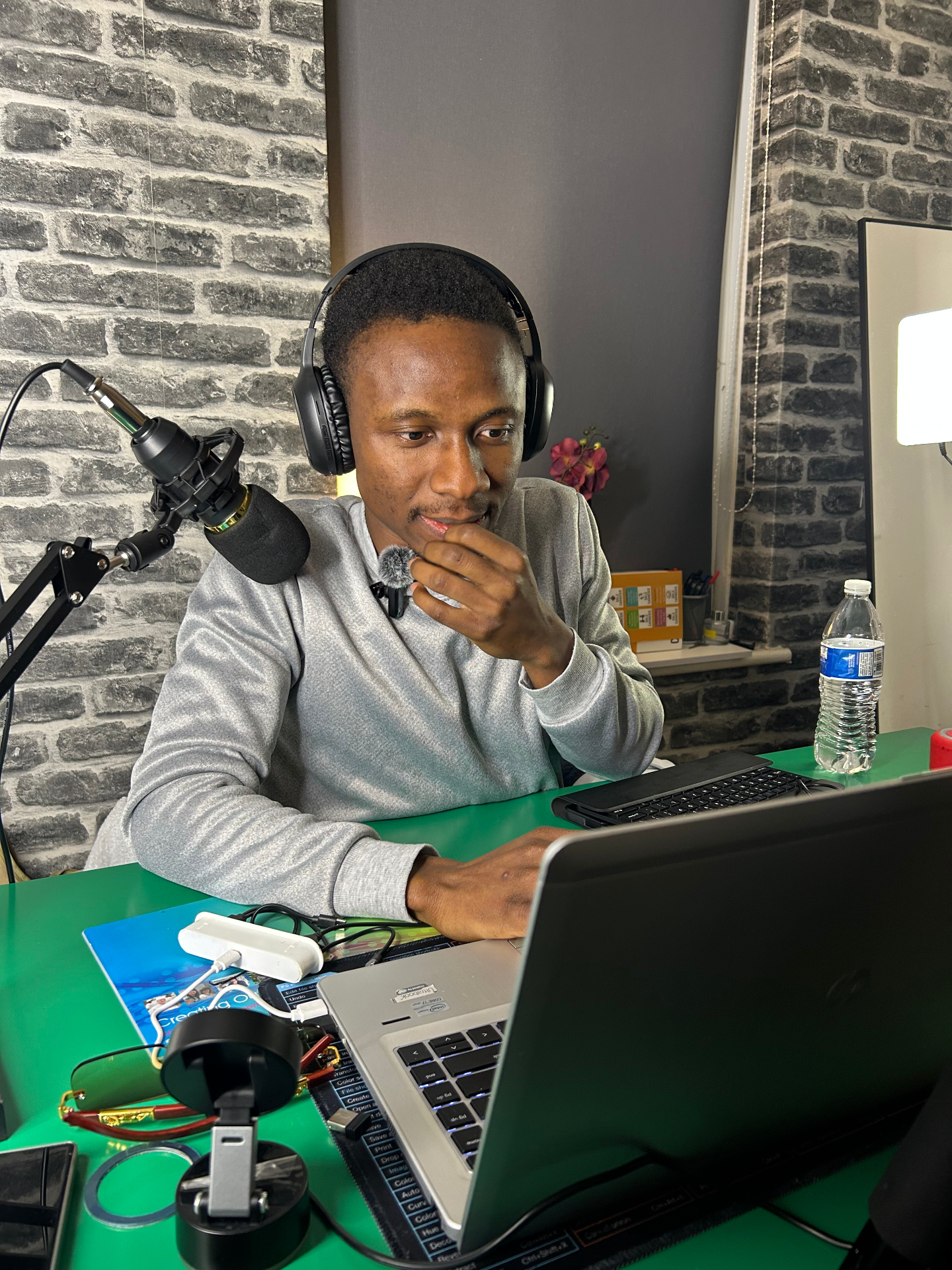 Joseph Ugwu recording a PAXJOE episode